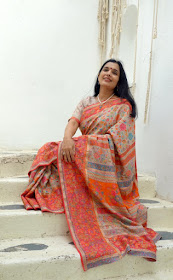 Orange floral kani saree