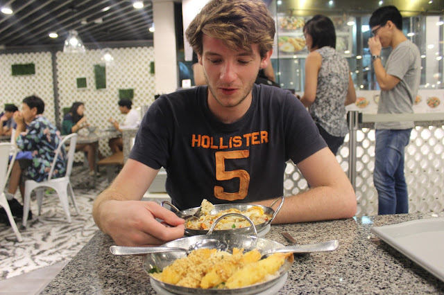 eating street food in singapore