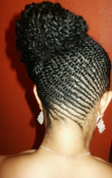 Here's is an elegant natural updo with twists courtesy of the fabulous 