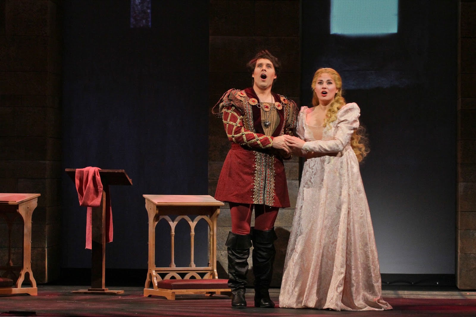 IN PERFORMANCE: Tenor JONATHAN BOYD as Roméo (left) and soprano MARIE-EVE MUNGER as Juliette (right) in Opera Carolina’s production of Charles Gounod’s ROMÉO ET JULIETTE, January 2016 [Photo by Jon Silla, © by Opera Carolina]