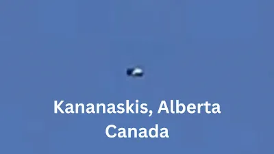 Awesome silver metallic UFO sighting over Alberta Canada.