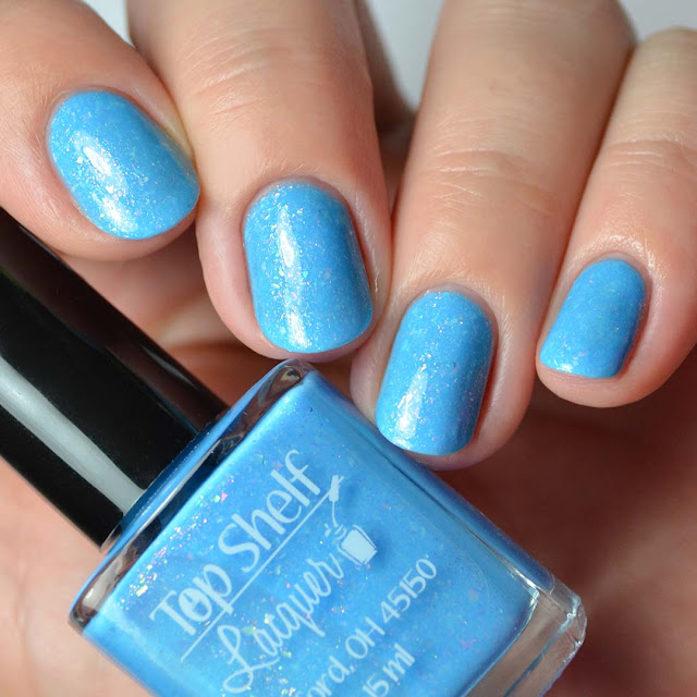 blue nail polish with color shifting flakies