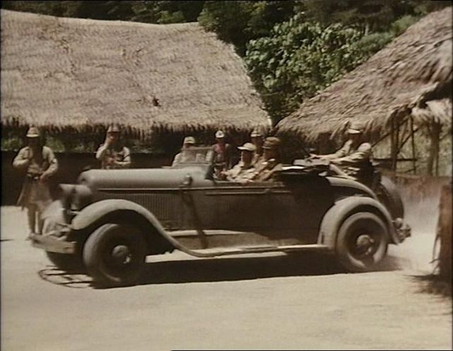 The commander in an old classic car 1929 Chrysler 