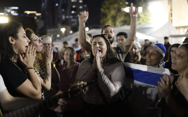 Mixed emotions as first group of Israeli hostages return from Gaza