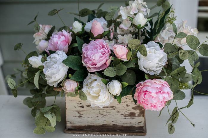 Peony arrangement in white painted box