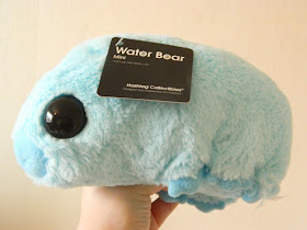 A blue plush toy of a water bear from Firebox