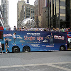 Sightseers Swing Past Earth - At Columbus Circle.