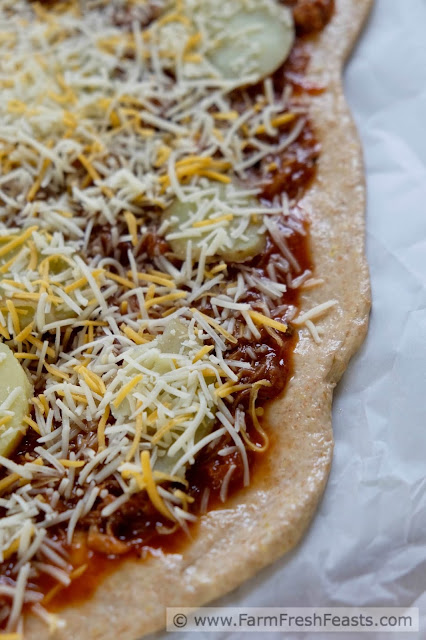 Got leftover pulled pork? Grab a potato, some cheese and some more BBQ sauce for this yummy pizza. Making something fresh out of leftovers for Friday Night Pizza Night.