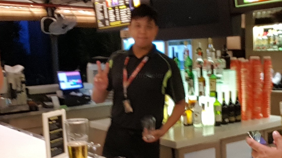 Filipino bartender at Singapore Changi Airport Cactus Bar
