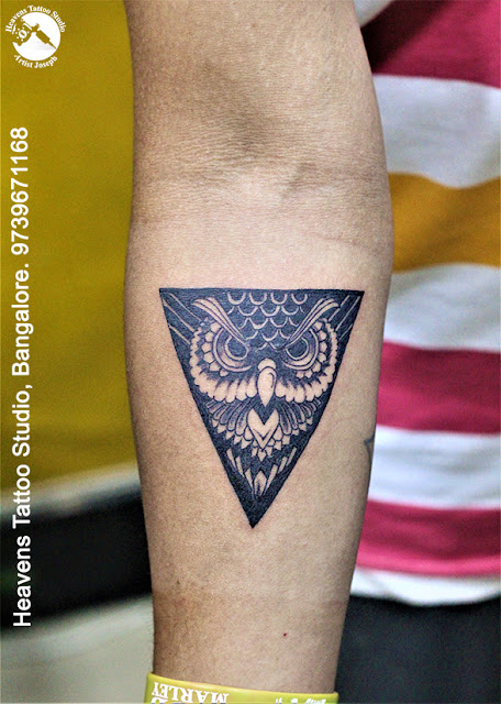 http://heavenstattoobangalore.in/triangle-owl-tattoo-at-heavens-tattoo-studio-bangalore/
