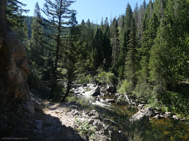 54: ledge cut into the rock above the river