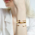 Golden statement bracelets