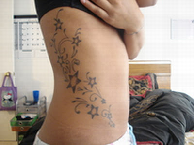 unique star tattoos for women. Star Tattoo Back Design Unique