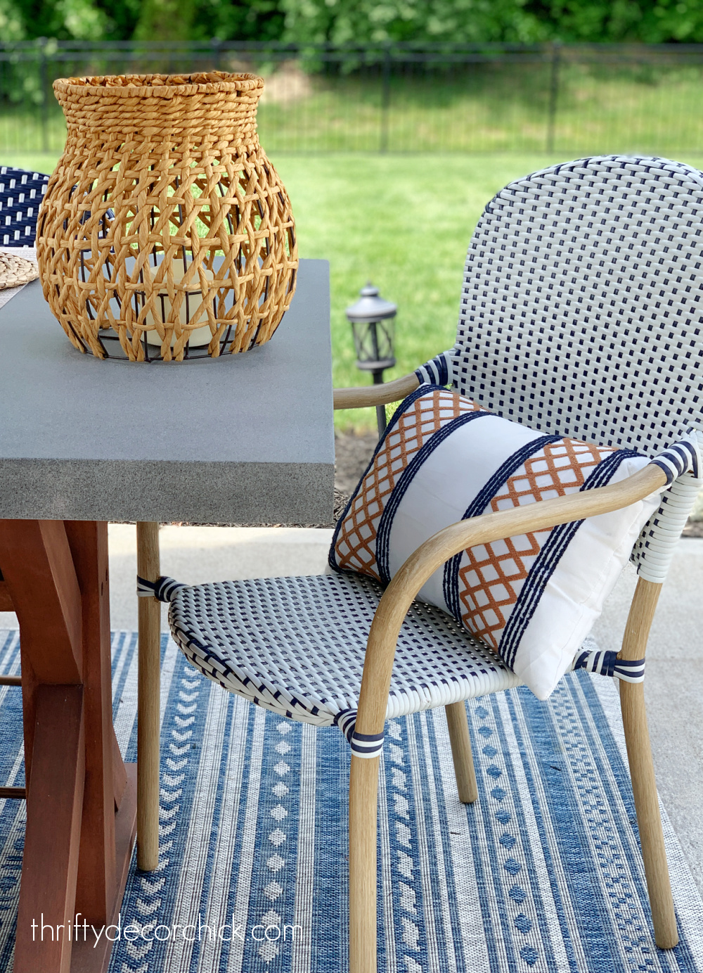 blue and white chairs cement table