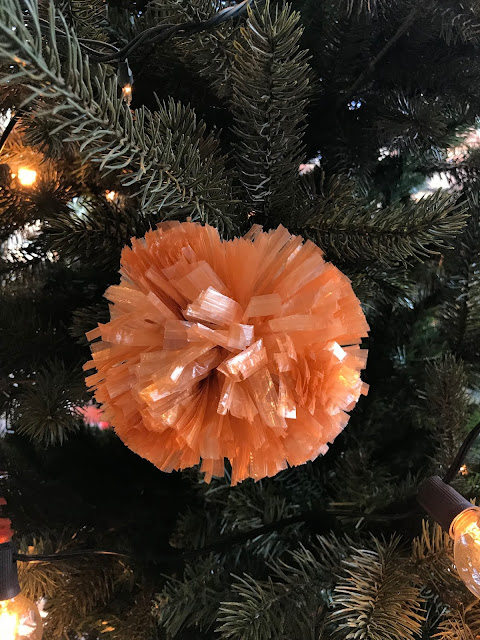 Christmas tree, Christmas, Christmas decorations, Anthropologie, blah to TADA, pompoms, DIY ornaments, Christmas ornaments, pompoms made from plastic bags, handmade pompoms, Christmas lights, store window, store display