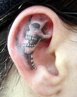 Small angel tattoo behind ear. ear ink tattoos