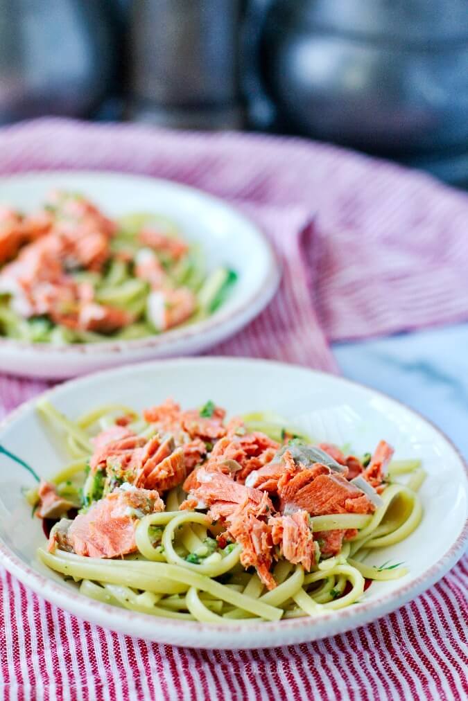 Pesto Linguine with salmon in bowls