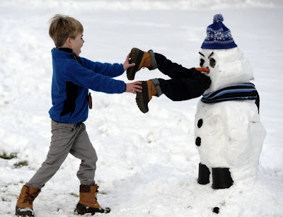 Snowman eating a child