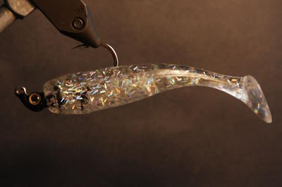 three inch holographic CAL tail on a jig head