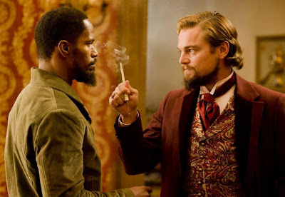 jamie foxx as django, leonardo dicaprio as calvin candie, django unchained directed by quentin tarantino