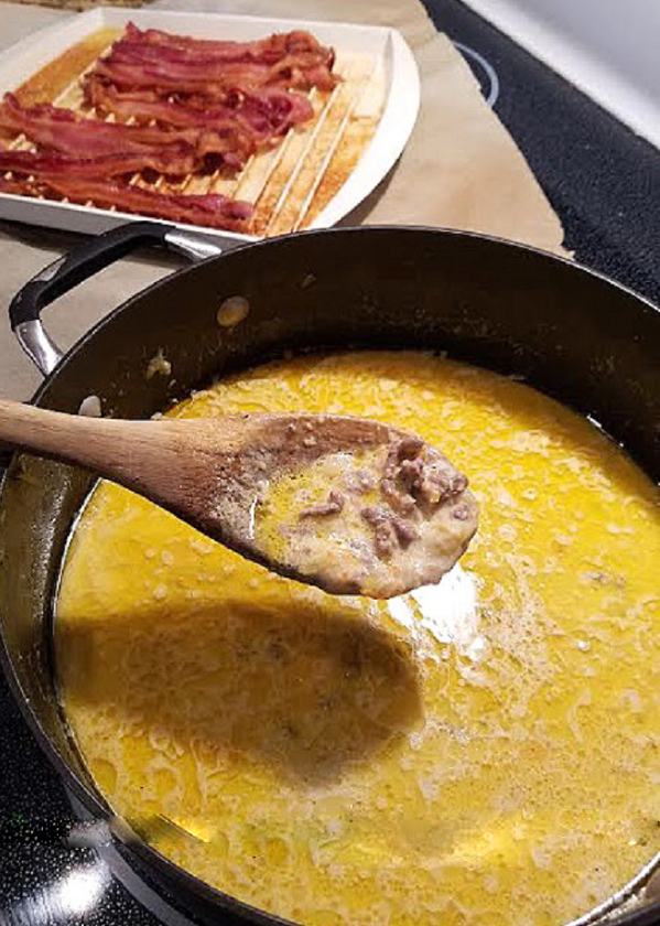 a pot of cheeseburger soup cooking