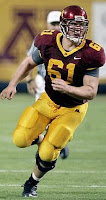 Gopher football player running for the ball