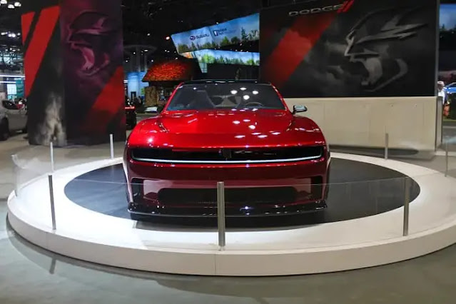 A red Dodge Charger Daytona SRT concept, seen from the front