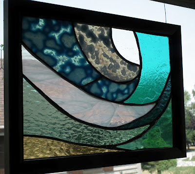 Abstract underwater wave stained glass piece