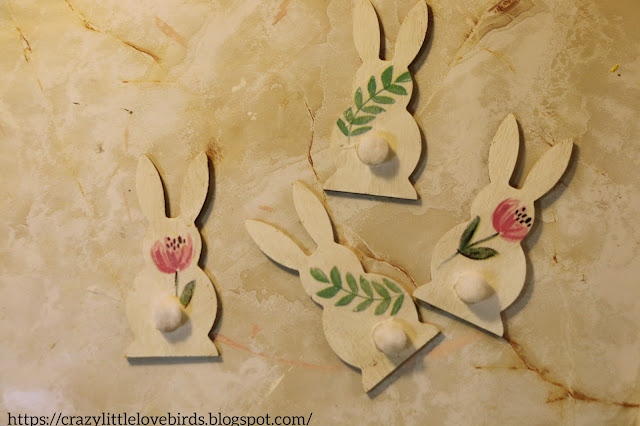 Decorated wooden bunnies