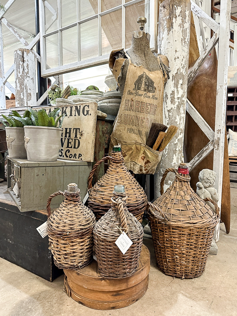vintage wicker wrapped demijohns