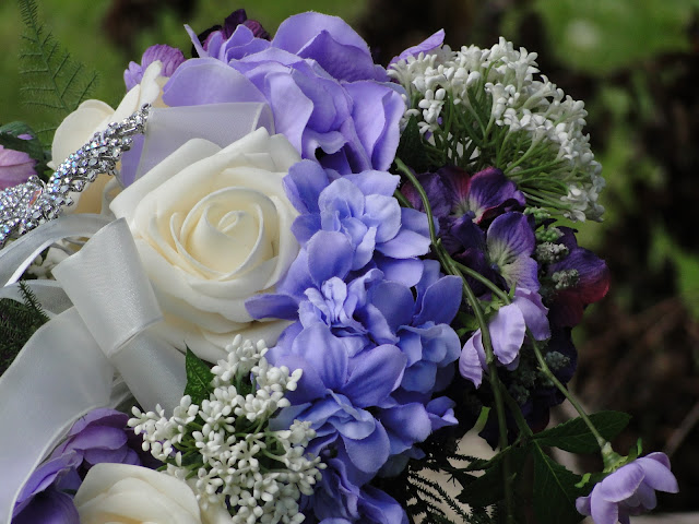 purple and white wedding bouquet with silk flowers the Camellia