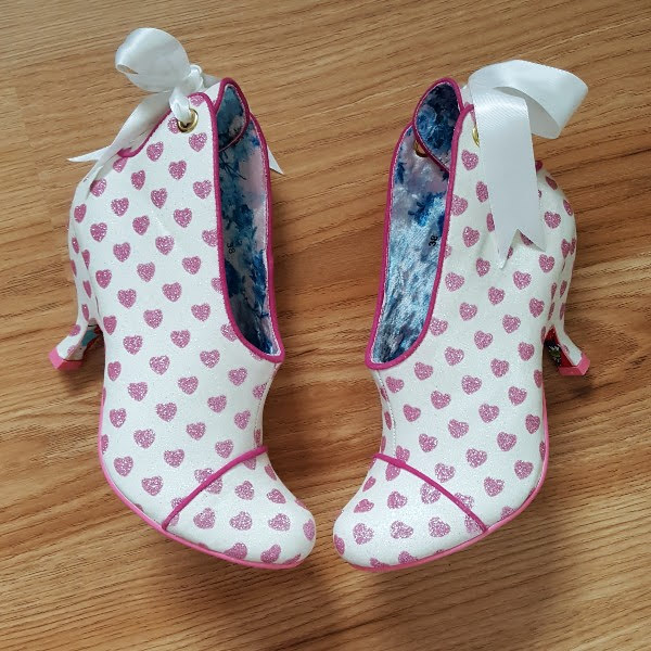 Irregular Choice Love Is All Around on wooden floor