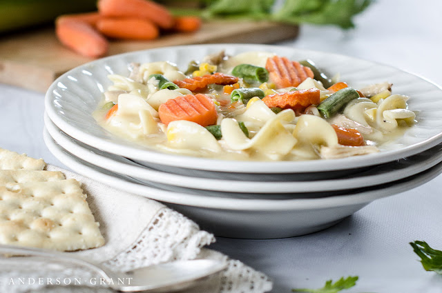 White bowl filled with Creamy Chicken Noodle Soup