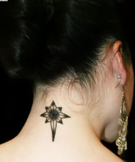 Black star tattoo ideas backside on neck