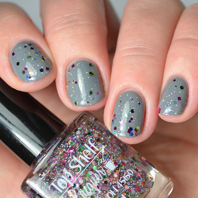 rainbow glitter nail polish four finger swatch