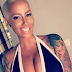Amber Rose puts her massive b00bs on display in new photos