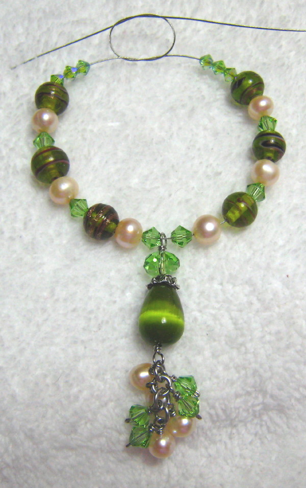 under construction green themed necklace