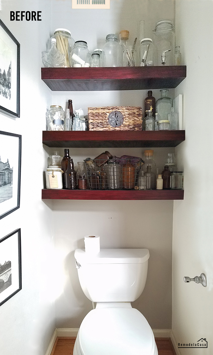 DIY Floating shelves above the toilet with a old bottle collection