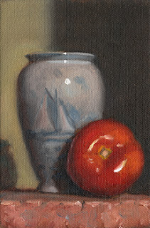 Still life oil painting of a blue vase beside a red tomato.