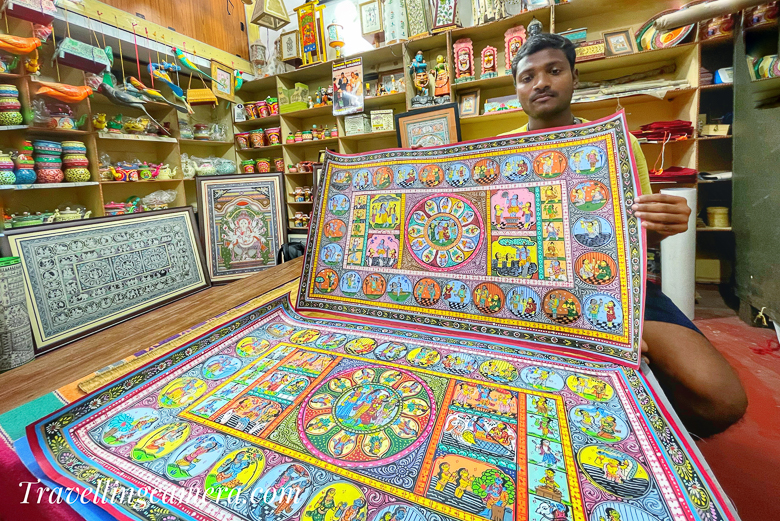 During this visit, we happened to walk inside a shop where we met son of National Awardee Biswanath Swain. Above photograph shows his son. When I started finding more about Biswanath Swain on internet, I was extremely sad to not find enough and hence decided to dedicate a separate blogpost about Biswanath Swain and his work in the field of Pattachitra artform. He was given National Award in 2015 (Palm Leaf Engraving) and more artists from Odisha can be found here.