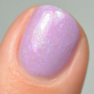 purple nail polish with flakies