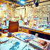 Working room of very busy artist, cluttered...