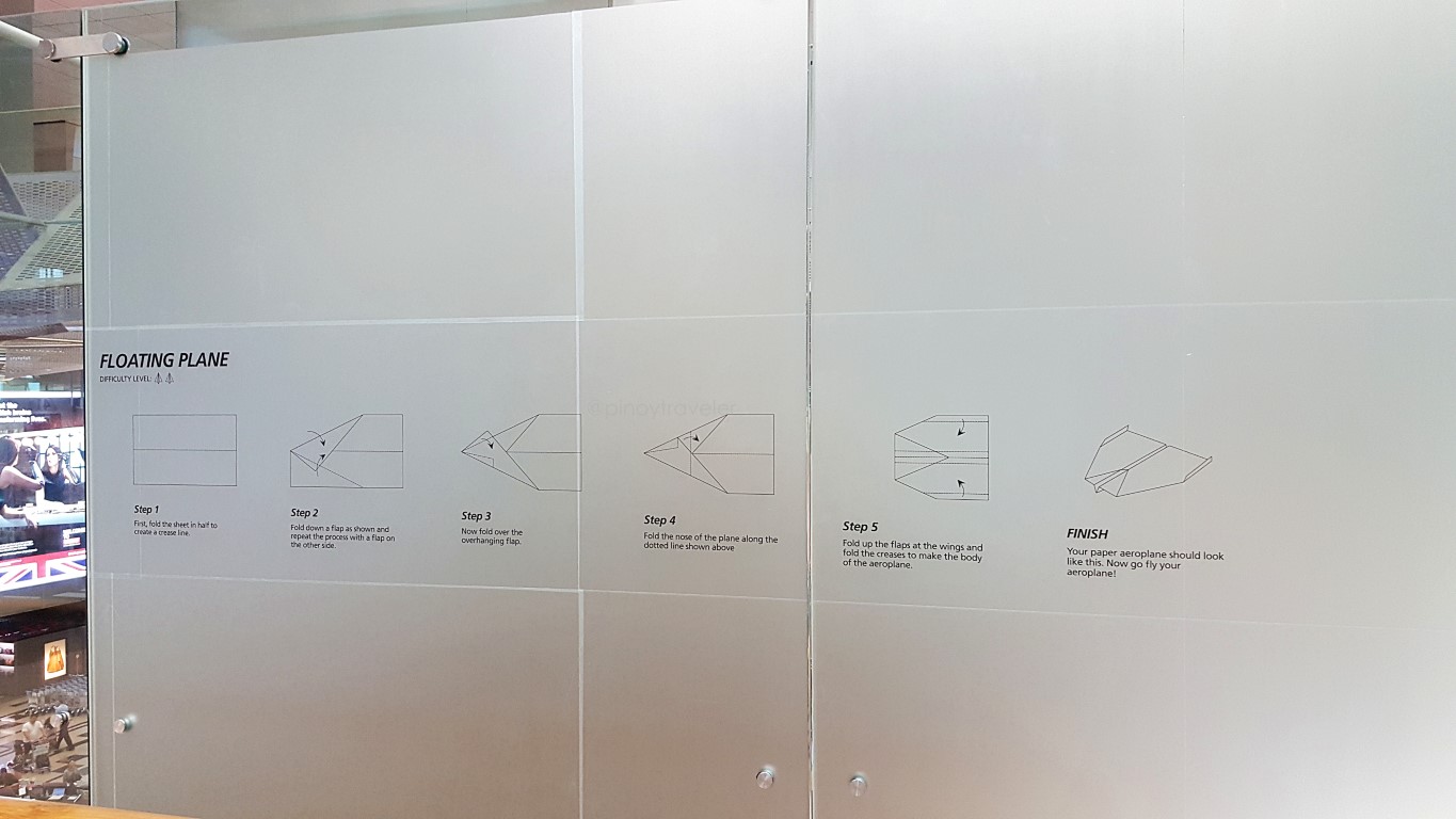 "Floating Plane" an instruction on how to make a paper plane at Changi's Aviation Gallery!