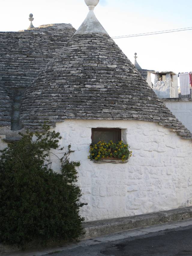 Alberobello, the city of drystone dwellings known as trulli , is an exceptional example of vernacular architecture. It is one of the best preserved and most homogeneous urban areas of this type in Europe. Its special features, and the fact that the buildings are still occupied, make it unique. It also represents a remarkable survival of prehistoric building techniques.