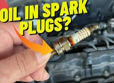 How to fix oil on spark plugs