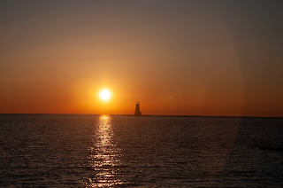 Setting sun on Lake Michigan horizontal