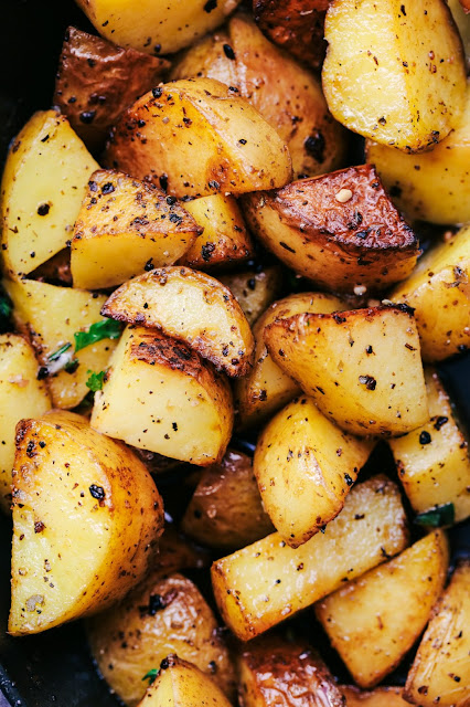 SKILLET GARLIC BUTTER HERB STEAK AND POTATOES