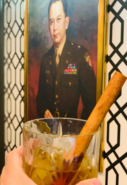 Portrait  of Carlos P Romulo & Don Papa rum cocktail