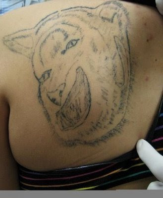 Labels: amazing back pieces, animals, awful tattoos, bad tattoos, cats, 