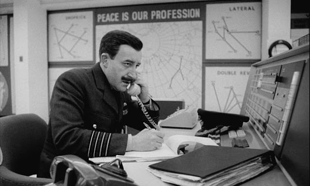 Peter Sellers as Lionel Mandrake in Dr. Strangelove